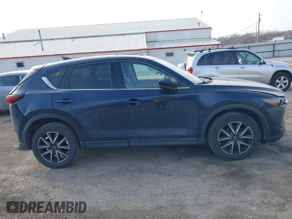 2018 Mazda CX-5 Grand Touring with VIN JM3KFBDM7J0338665, listed as a IAAI auction lot 41546019 with 141,740 mi miles. Bid and sale history available at carsss.com. Image 13.