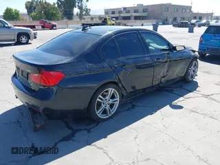2014 BMW 3 Series 328i with VIN WBA3C1C54EK112620, listed as a IAAI auction lot 42712414 with 169,297 mi miles and . Bid and sale history available at DreamBid. Image 4.