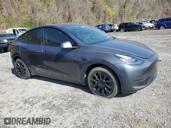 2021 Tesla Model Y Long Range with VIN 5YJYGDEE9MF119974, listed as a Copart auction lot 53794025 with 66,411 mi miles and Salvage Title. Bid and sale history available at DreamBid. Image 4.