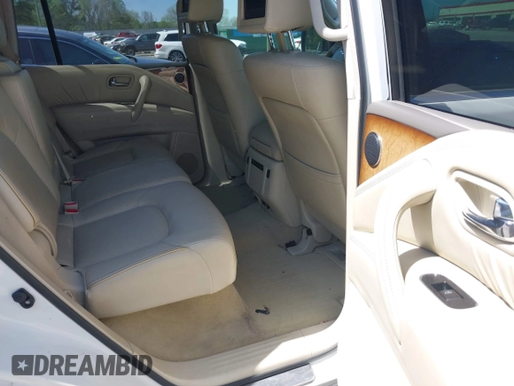 2012 Infiniti QX56 8-passenger with VIN JN8AZ2ND5C9716530, listed as a IAAI auction lot 42031101 with 153,432 mi miles and . Bid and sale history available at DreamBid. Image 8.