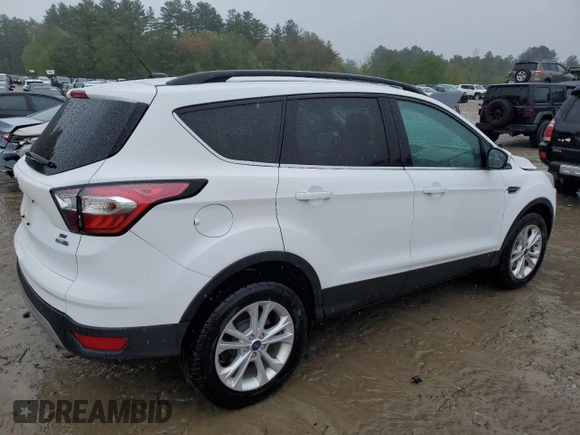 2018 Ford Escape SE z VIN 1FMCU9GD2JUA76985, wystawiony jako Copart lot #55743855 z przebiegiem 84 549 mil mil oraz Szkody całkowita. Historia ofert i sprzedaży dostępna na DreamBid. Obrazek 3.