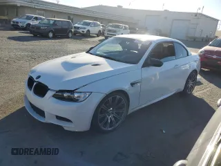 2011 BMW M3 with VIN WBSDX9C59BE784136, listed as a Copart auction lot 77696754 with 71,332 mi miles and Salvage Title. Bid and sale history available at carsss.com. Image 1.