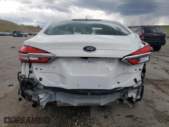 2020 Ford Fusion SE z VIN 3FA6P0T9XLR138977, wystawiony jako Copart lot #55260085 z przebiegiem 92 470 mil mil oraz Szkoda całkowita • Salvage title. Historia ofert i sprzedaży dostępna na DreamBid. Obrazek 6.