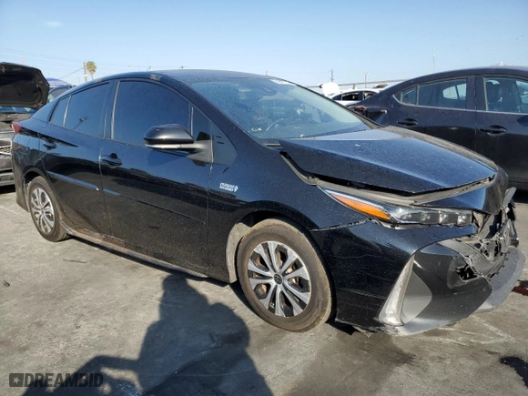 2022 Toyota Prius Prime LE with VIN JTDKAMFPXN3202741, listed as a Copart auction lot 85609764 with 90,309 mi miles and Salvage Title. Bid and sale history available at carsss.com. Image 4.