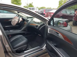 2016 Lincoln MKZ with VIN 3LN6L2G91GR614983, listed as a IAAI auction lot 42345061 with 35,977 mi miles and . Bid and sale history available at DreamBid. Image 5.