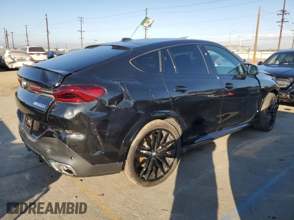 2024 BMW X6 M60i with VIN 5UX43EX09R9S59072, listed as a Copart auction lot 79769544 with 8,527 mi miles and Salvage Title. Bid and sale history available at carsss.com. Image 3.