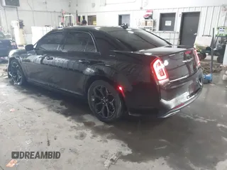 2019 Chrysler 300 with VIN 2C3CCABG6KH617913, listed as a IAAI auction lot 41558437 with 113,073 mi miles. Bid and sale history available at carsss.com. Image 3.