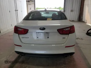 2015 Kia Optima LX z VIN KNAGM4A78F5616317, wystawiony jako Copart lot #58514075 z przebiegiem 123 657 mil mil oraz Szkoda całkowita • Salvage title. Historia ofert i sprzedaży dostępna na DreamBid. Obrazek 6.