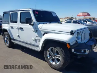 2020 Jeep Wrangler Unlimited Sahara with VIN 1C4HJXEN5LW277208, listed as a IAAI auction lot 41640906 with 61,774 mi miles. Bid and sale history available at carsss.com. Image 1.