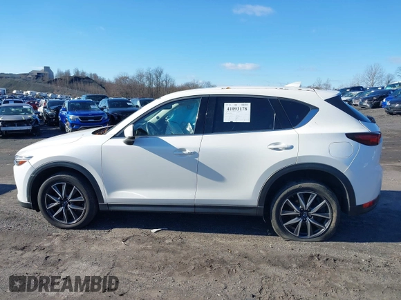 2017 Mazda CX-5 Grand Touring with VIN JM3KFBDL6H0188517, listed as a IAAI auction lot 41093178 with 98,831 mi miles. Bid and sale history available at carsss.com. Image 14.