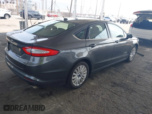 2015 Ford Fusion SE Hybrid with VIN 3FA6P0LU6FR309099, listed as a IAAI auction lot 42497429 with 157,631 mi miles and . Bid and sale history available at DreamBid. Image 4.