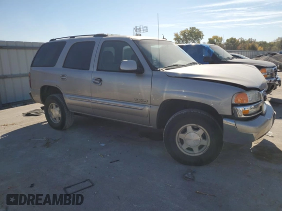 2005 GMC Yukon SLE with VIN 1GKEC13T95J221417, listed as a Copart auction lot 77009394 with 308,033 mi miles and Salvage Title. Bid and sale history available at carsss.com. Image 4.