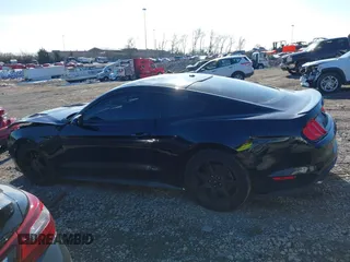 2019 Ford Mustang EcoBoost with VIN 1FA6P8TH8K5173458, listed as a IAAI auction lot 41085251 with 99,260 mi miles and . Bid and sale history available at carsss.com. Image 14.