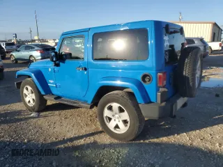 2011 Jeep Wrangler Sahara with VIN 1J4GA5D15BL632709, listed as a Copart auction lot 84118104 with 87,644 mi miles and Salvage Title. Bid and sale history available at DreamBid. Image 2.