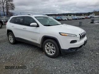 2015 Jeep Cherokee North with VIN 1C4PJMCB2FW594225, listed as a Copart auction lot 80424404 with 126,879 mi miles and Salvage Title. Bid and sale history available at carsss.com. Image 4.