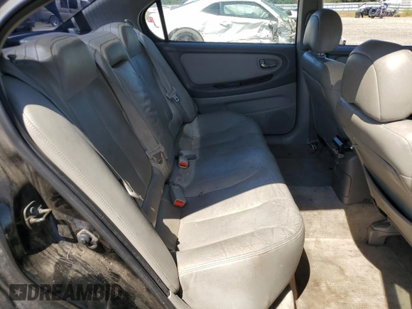 2000 Nissan Maxima GXE z VIN JN1CA31D6YT762114, wystawiony jako Copart lot #57908775 z przebiegiem 207 805 mil mil oraz Szkoda całkowita • Salvage title. Historia ofert i sprzedaży dostępna na DreamBid. Obrazek 10.