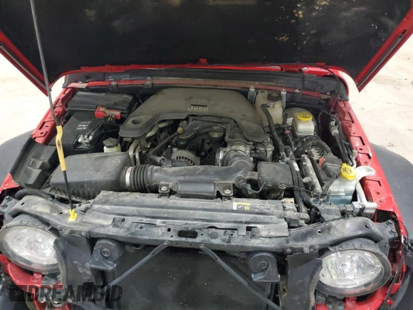 2019 Jeep Wrangler Unlimited Sport S with VIN 1C4HJXDG2KW646608, listed as a Copart auction lot 58535105 with 111,230 mi miles and Salvage title. Bid and sale history available at DreamBid. Image 12.
