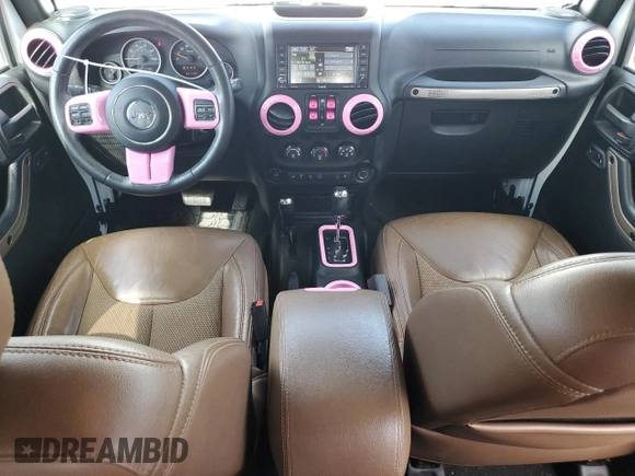 2016 Jeep Wrangler Unlimited Sahara with VIN 1C4BJWEG1GL328101, listed as a Copart auction lot 52754865 with 65,106 mi miles and Salvage title. Bid and sale history available at DreamBid. Image 8.