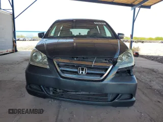 2006 Honda Odyssey EX with VIN 5FNRL384X6B461661, listed as a Copart auction lot 61051915 with 190,578 mi miles and Salvage title. Bid and sale history available at DreamBid. Image 5.