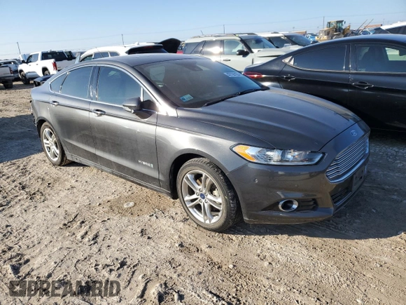 2016 Ford Fusion Titanium Hybrid with VIN 3FA6P0RU9GR289892, listed as a Copart auction lot 42735125 with 82,386 mi miles and Salvage Title. Bid and sale history available at carsss.com. Image 4.