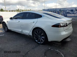2017 Tesla Model S 100D z VIN 5YJSA1E21HF229936, wystawiony jako Copart lot #54734955 z przebiegiem 125 511 mil mil oraz Szkoda całkowita • Salvage title. Historia ofert i sprzedaży dostępna na DreamBid. Obrazek 2.