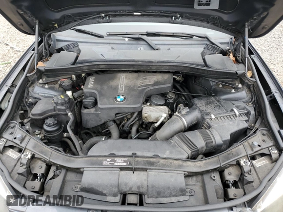 2015 BMW X1 xDrive28i with VIN WBAVL1C5XFVY31265, listed as a Copart auction lot 47543025 with 124,986 mi miles and Salvage Title. Bid and sale history available at carsss.com. Image 12.