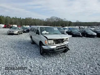 1999 Nissan Frontier XE with VIN 1N6DD26SXXC344449, listed as a Copart auction lot 43748015 with 137,318 mi miles and Salvage title. Bid and sale history available at DreamBid. Image 10.