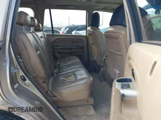2005 Honda Pilot EX-L z VIN 2HKYF18665H523484, wystawiony jako IAAI lot #41697429 z przebiegiem 294 241 mil mil oraz . Historia ofert i sprzedaży dostępna na DreamBid. Obrazek 8.