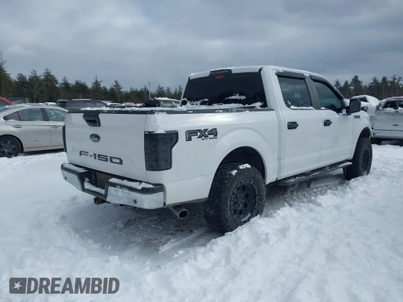 2018 Ford F-150 XL with VIN 1FTEW1E58JKD67099, listed as a IAAI auction lot 41526282 with 128,420 mi miles. Bid and sale history available at carsss.com. Image 4.