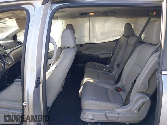 2018 Honda Odyssey EX-L with VIN 5FNRL6H71JB089289, listed as a IAAI auction lot 41813322 with 94,933 mi miles and . Bid and sale history available at DreamBid. Image 8.