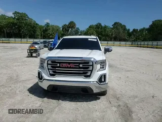 2019 GMC Sierra 1500 SLT z VIN 3GTP8DED8KG245539, wystawiony jako Copart lot #52478105 z przebiegiem 60 008 mil mil oraz Szkoda całkowita • Salvage title. Historia ofert i sprzedaży dostępna na DreamBid. Obrazek 11.