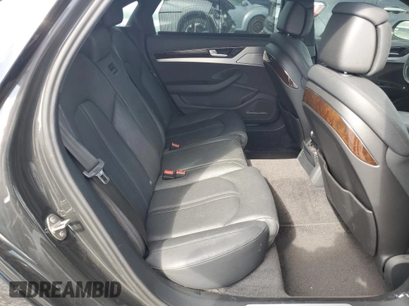 2014 Audi A8 4.0T с VIN WAUR2AFDXEN011628, выставлен на аукционе Copart как лот 55423285 с пробегом 94 681 миль миль и Списание • Salvage title. История ставок и продаж доступна на DreamBid. Изображение 10.