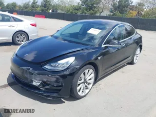 2018 Tesla Model 3 Long Range Battery with VIN 5YJ3E1EA3JF060296, listed as a IAAI auction lot 41901636 with 110,847 mi miles. Bid and sale history available at carsss.com. Image 2.