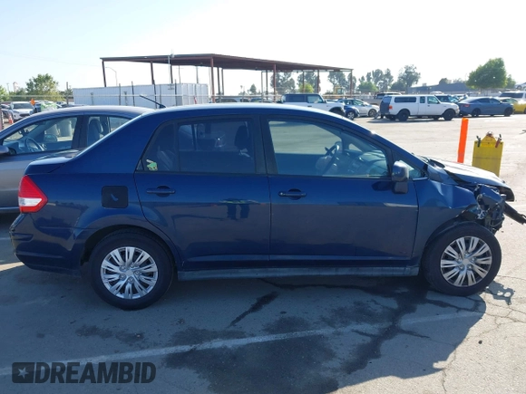 2009 Nissan Versa S with VIN 3N1BC11E49L493099, listed as a IAAI auction lot 42170459 with 209,788 mi miles and . Bid and sale history available at DreamBid. Image 14.