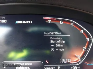 2021 BMW X4 M40i with VIN 5UX2V5C0XM9E16773, listed as a IAAI auction lot 41230634 with 52,779 mi miles. Bid and sale history available at carsss.com. Image 16.