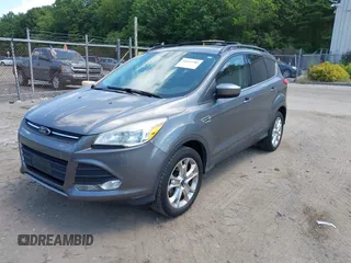 2013 Ford Escape SE with VIN 1FMCU9GXXDUA97162, listed as a IAAI auction lot 42633382 with 74,375 mi miles and . Bid and sale history available at DreamBid. Image 2.