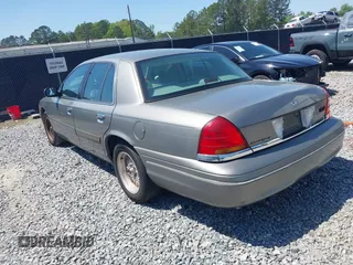 1999 Ford Crown Victoria LX с VIN 2FAFP74W8XX160853, выставлен на аукционе IAAI как лот 41987108 с пробегом 100 582 миль миль и . История ставок и продаж доступна на DreamBid. Изображение 3.