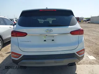 2019 Hyundai Santa Fe SE with VIN 5NMS23AD8KH051223, listed as a IAAI auction lot 42017754 with 146,704 mi miles and . Bid and sale history available at DreamBid. Image 15.