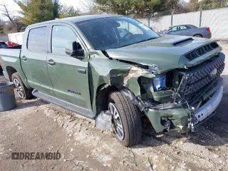 2021 Toyota Tundra SR5 with VIN 5TFDY5F1XMX974055, listed as a IAAI auction lot 41452934 with 52,785 mi miles and . Bid and sale history available at DreamBid. Image 1.