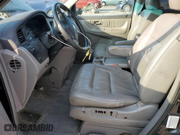 2003 Honda Odyssey EX-L with VIN 5FNRL189X3B114181, listed as a Copart auction lot 54316105 with 103,214 mi miles and Salvage Title. Bid and sale history available at DreamBid. Image 7.