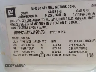 2005 GMC Yukon SLT with VIN 1GKEC13T35J128179, listed as a IAAI auction lot 41985296 with 255,582 mi miles. Bid and sale history available at carsss.com. Image 9.