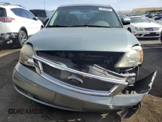 2007 Ford Five Hundred SEL z VIN 1FAHP24197G143131, wystawiony jako Copart lot #54249095 z przebiegiem 153 305 mil mil oraz Tytuł czysty. Historia ofert i sprzedaży dostępna na DreamBid. Obrazek 5.