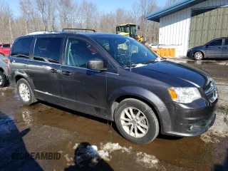 2018 Dodge Grand Caravan SXT with VIN 2C4RDGCGXJR325632, listed as a Copart auction lot 46326655 with 128,692 mi miles and Clean Title. Bid and sale history available at DreamBid. Image 4.