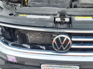 2022 Volkswagen Tiguan SE z VIN 3VV2B7AX5NM082093, wystawiony jako IAAI lot #42339761 z przebiegiem 74 185 mil mil oraz . Historia ofert i sprzedaży dostępna na DreamBid. Obrazek 1.