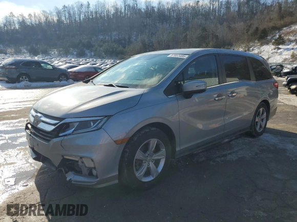 2019 Honda Odyssey EX with VIN 5FNRL6H59KB074264, listed as a Copart auction lot 87653495 with 104,422 mi miles and Salvage Title. Bid and sale history available at carsss.com. Image 1.