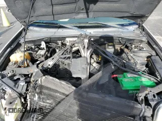 2007 Mercury Mariner Premier z VIN 4M2CU87147KJ17376, wystawiony jako Copart lot #51513755 z przebiegiem 93 763 mil mil oraz Szkody całkowita. Historia ofert i sprzedaży dostępna na DreamBid. Obrazek 14.