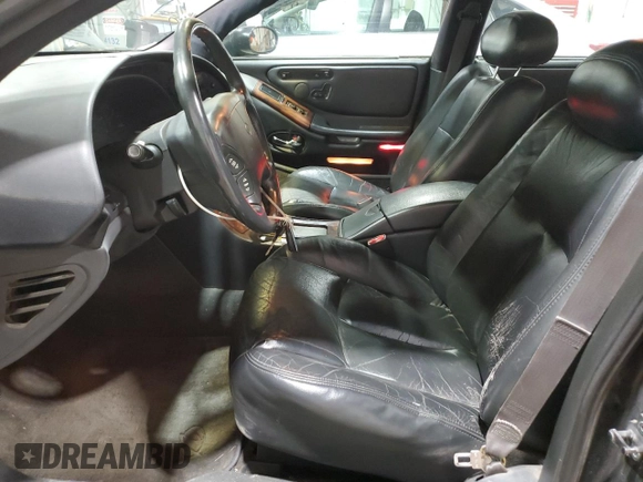 1999 Oldsmobile Aurora with VIN 1G3GR62C8X4117519, listed as a Copart auction lot 77984084 with 188,949 mi miles and Clean Title. Bid and sale history available at DreamBid. Image 7.
