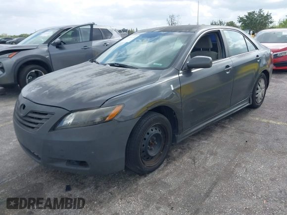 2007 Toyota Camry CE with VIN 4T1BE46K07U097127, listed as a IAAI auction lot 42091193 with 148,623 mi miles. Bid and sale history available at carsss.com. Image 2.