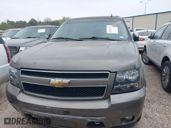 2014 Chevrolet Tahoe LT with VIN 1GNSCBE08ER106419, listed as a IAAI auction lot 41789896 with 99,420 mi miles and . Bid and sale history available at DreamBid. Image 12.