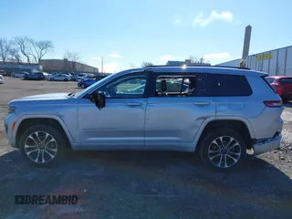 2021 Jeep Grand Cherokee Overland with VIN 1C4RJKDG0M8122002, listed as a IAAI auction lot 41748944 with 88,336 mi miles and . Bid and sale history available at DreamBid. Image 14.